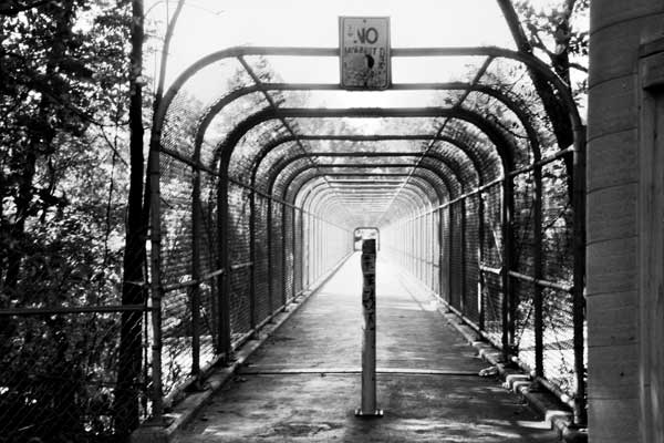 "Beyond" Fencing over bridge Pentax K1000 BW film